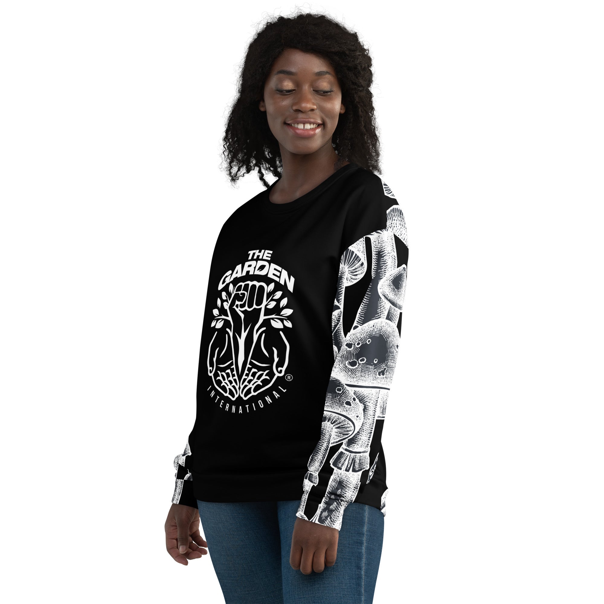 Black and white sweatshirt with mushroom-patterned sleeves, perfect for mycology enthusiasts, sustainable fashion fans, and eco-conscious shoppers.