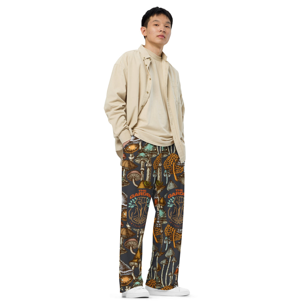 Black and Orange Mushroom Print Unisex Pants – Eco-Friendly Mycology-Inspired Fashion.